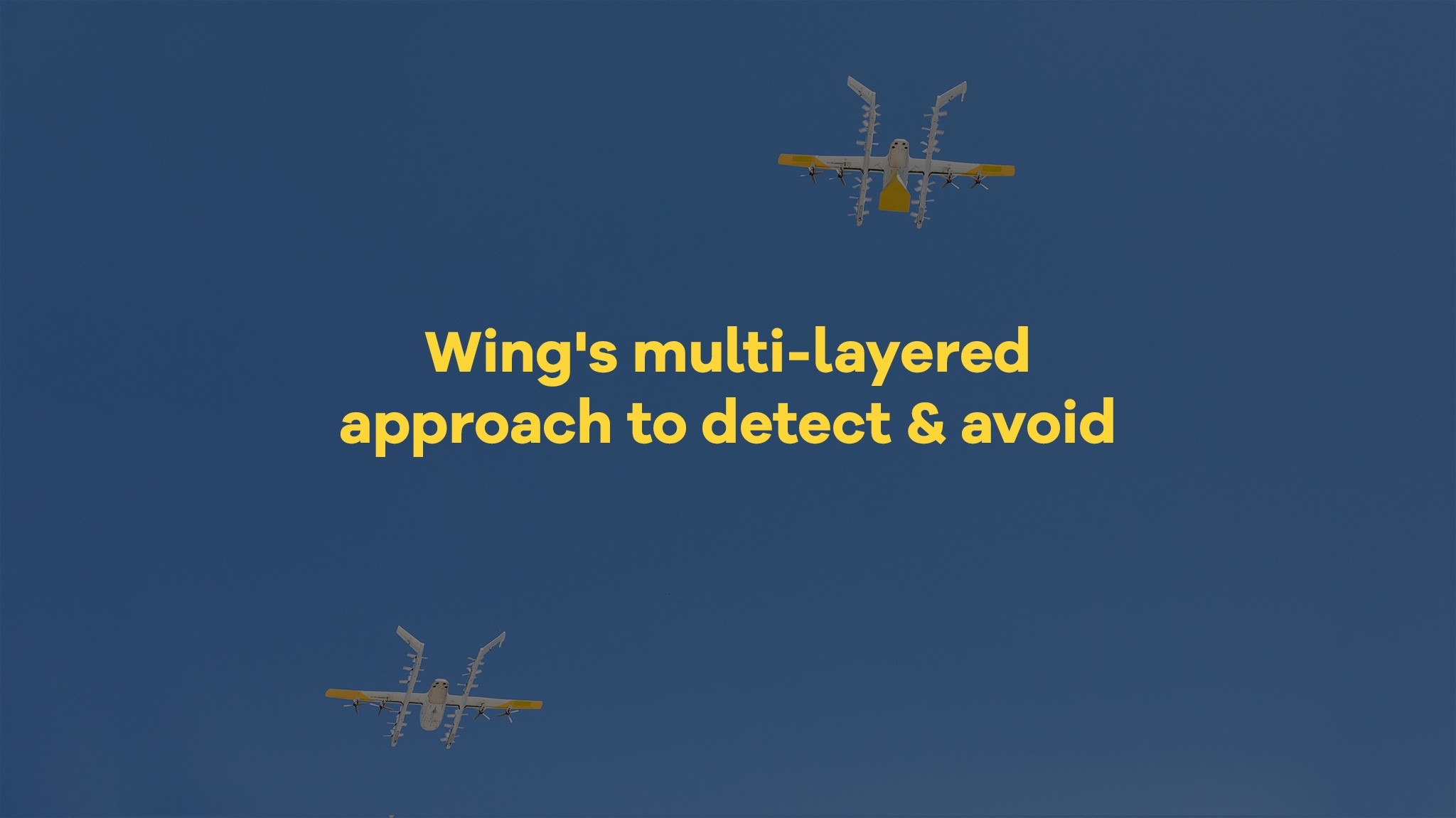 Two drones with distinctive wing designs fly in a clear blue sky, illustrating an advanced multi-layered approach to detect and avoid obstacles.